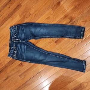 Vigoss skinny jeans size 7/8. Dark wash with white stitching. Double button fly